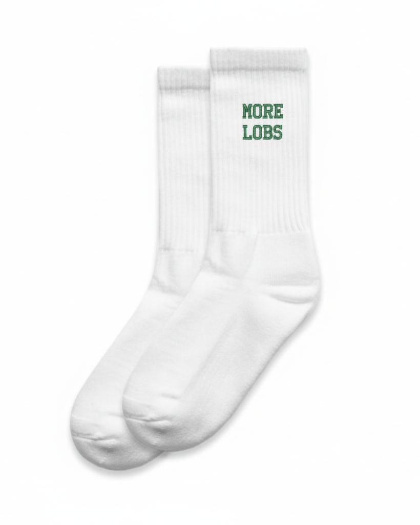 White padel socks with "more lobs" text on a white background