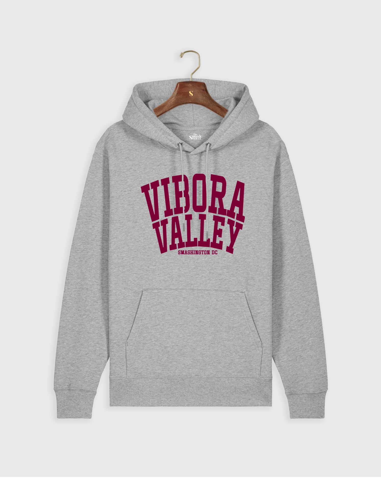 Grey padel hoodie with 'Vibora Valley' text on a hanger against a white background